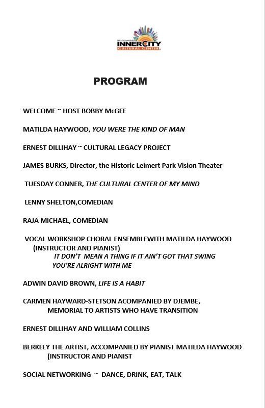 Portrait of a smiling woman wearing pearls and a dark outfit.