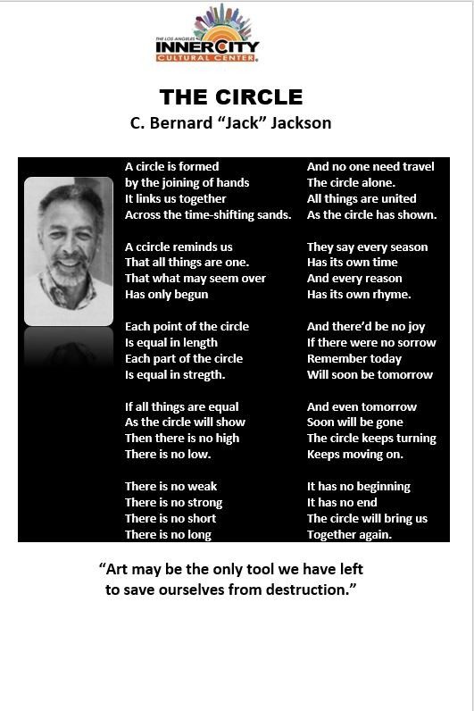 Portrait of a smiling woman wearing pearls and a dark outfit.